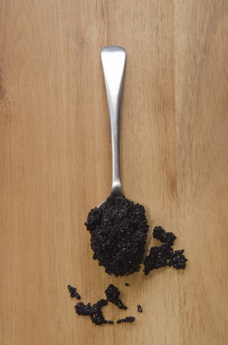vegetarian caviar and spoon on wooden board