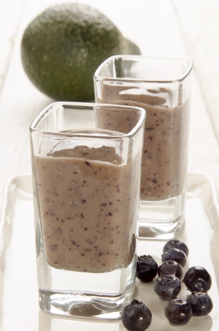 fresh made blueberry avocado smoothie in a glass fresh made blueberry avocado smoothie in a glass