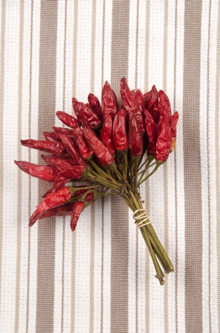 dried red chili on a kitchen towel