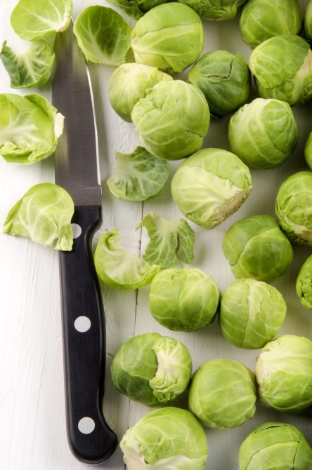 cleaned brussels sprout and kitchen knife