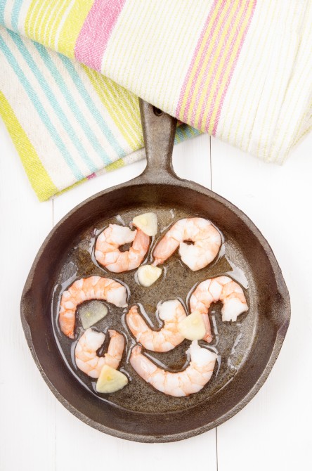 vietnamese king prawn with oil and garlic in a pan vietnamese king prawn with oil and garlic in a pan
