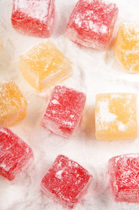 red and yellow turkish delight with powdered sugar