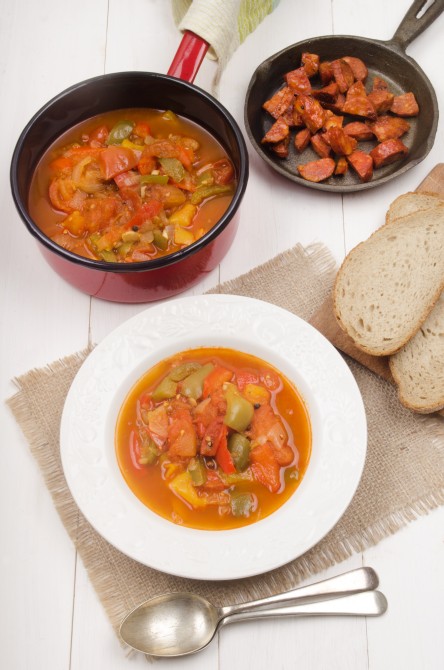 hungarian letcho with bread and kolbasz in a cast iron pan hungarian letcho with bread and kolbasz in a cast iron pan