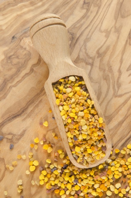 organic pollen on a wooden shovel