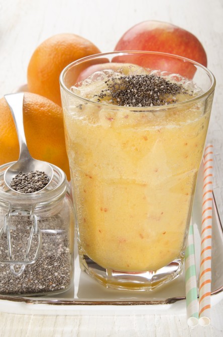 apple and orange smoothie with chia seed in a glass apple and orange smoothie with chia seed in a glass