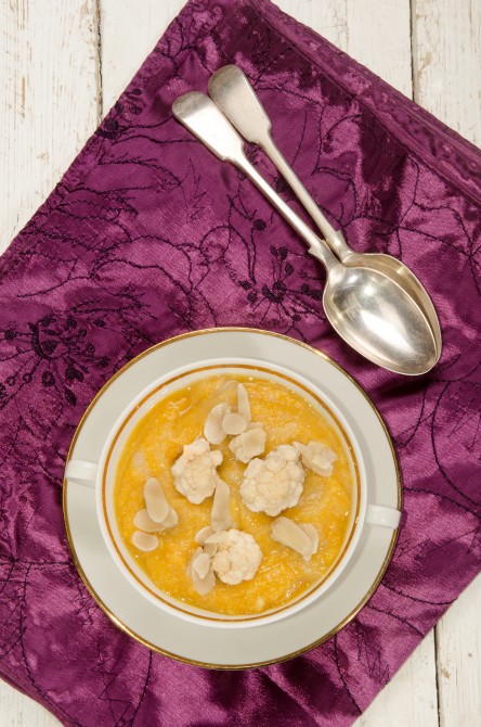 cauliflower curry soup with almond in a bowl 