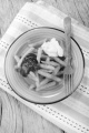 french fries with ketchup and mayonaise on a blue plate