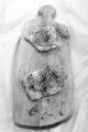 grilled cod with fresh thyme and pepper on a wooden board