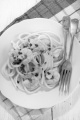 macaroni with cheese sauce, parsley and prawns
