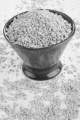 hulled pearl barley in a brown bowl