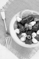 stuffed grape leaves, tomato, lemon, olive and mozzarella balls