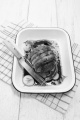 pork belly roll with minced meat and rice filling in an enamel bowl
