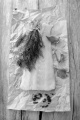 raw cod fillet with dill, garlic and pepper on brown kitchen paper