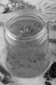 home made vinaigrette in a glass with chopped parsley
