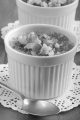 creme brulee with broken walnut in a small bowl
