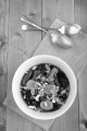 dried fruit compote with almond sliver and spoon