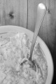 home made herb cottage cheese in a bowl with spoon