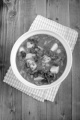 german pea soup with carrot, potato, smoked bacon and celery in a tureen