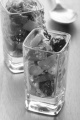 spicy mediterranean salad with olive, paprika and pepper in a shot glass