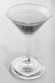 green woodruff vodka cocktail in a glass