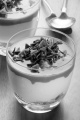 banoffee dessert with chocolate curls in a glass