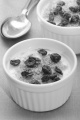 creme brulee with dried cranberries in a ramekin