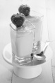 strawberry and mousse in a shot glass with spoon