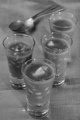 warm beef vegetable soup in a shot glass 