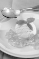 vanilla yogurt ice cream with orange and lime jelly on a plate