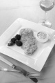oven baked potato crusted trout fillet with broccoli and glass of wine