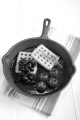 cast iron pan with potato waffle, tomato and kidney beans
