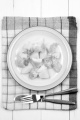 boiled potatoes with smoked cod and dill on a plate