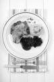 pork chop with red cabbage, gravy and potato dumpling on a plate