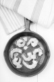 vietnamese king prawn with oil and garlic in a pan