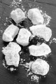 greek delight with powdered sugar on slate