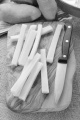 home made french fries and a kitchen knife on wooden board